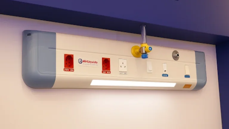 Unidad de cabecera hospitalaria con tomas de gases medicinales y energía.